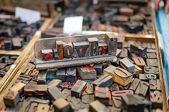 Vintage wooden letterpress blocks spelling love