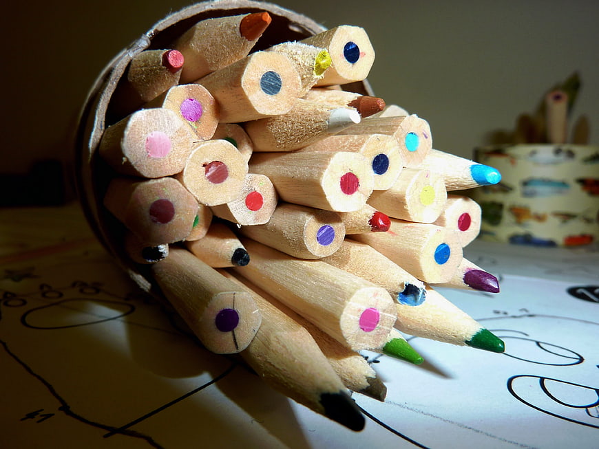 Spilled Colored Pencils on Children's Drawing Paper