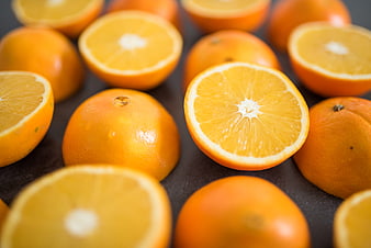 Fresh Sliced Oranges on Dark Background