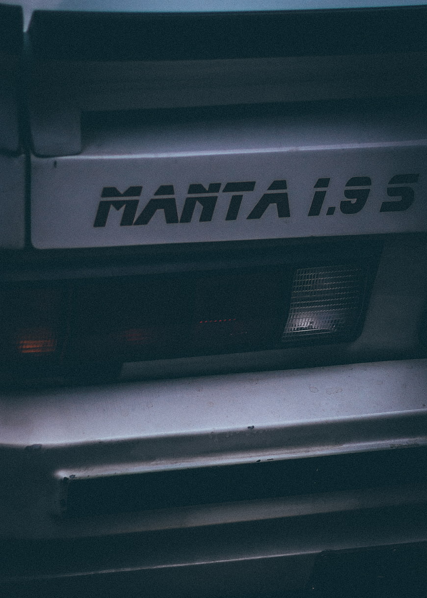Close-up of Manta 1.9 S car badge and taillight