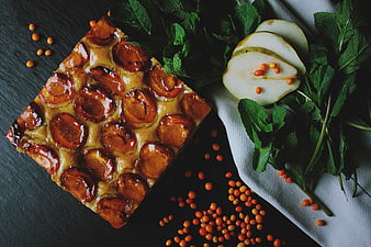 Caramelized Pear Tart with Mint and Berries on Dark Slate