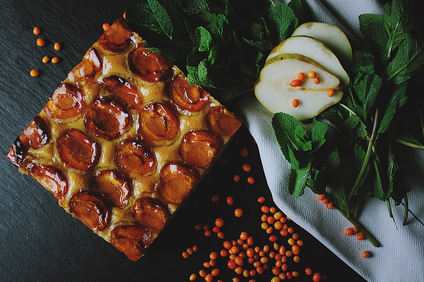 Caramelized Pear Tart with Mint and Berries on Dark Slate