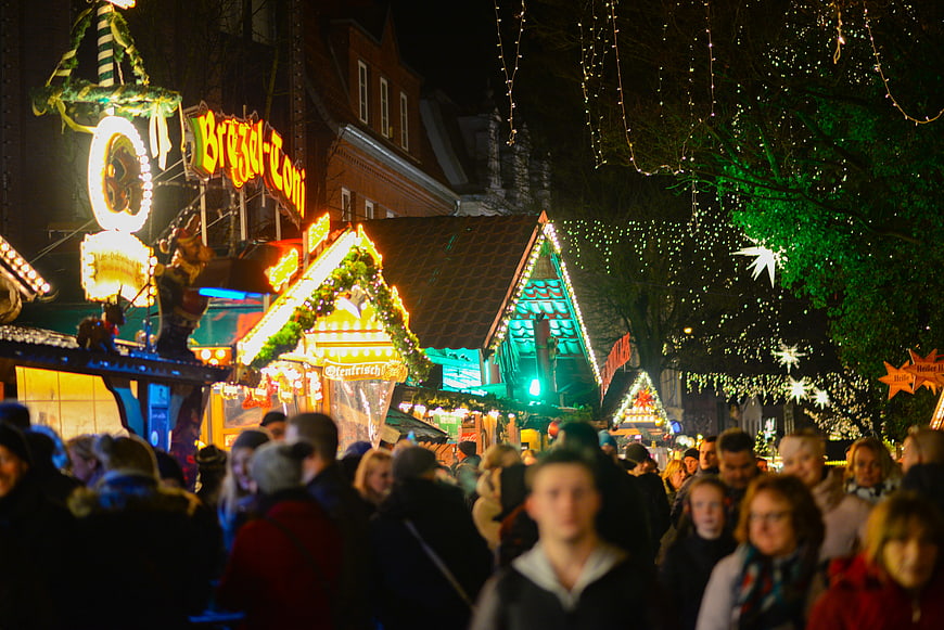 Crowded Christmas Market in Leer, Germany at Night