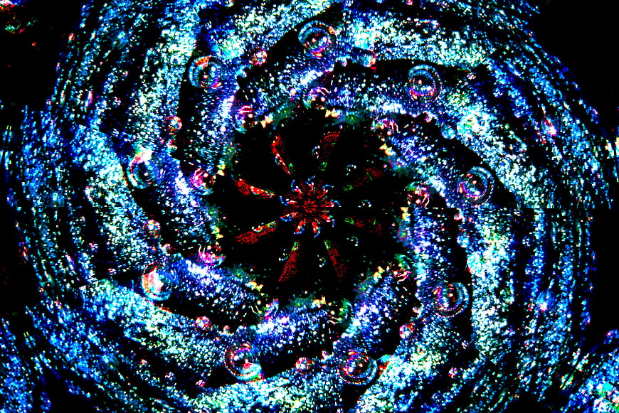 Abstract blue kaleidoscope pattern with swirling geometric design