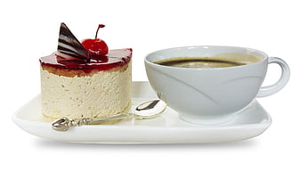 Cheesecake with cherry and coffee cup on white plate