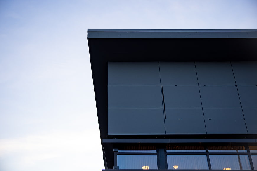 Modern Dark Blue House Exterior with Large Windows