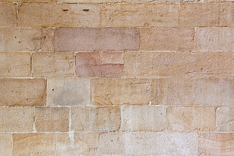 Textured Sandstone Brick Wall Background