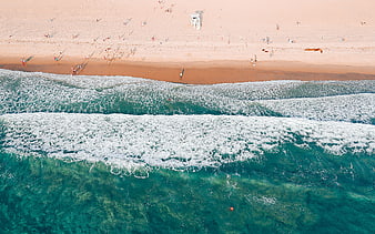 Aerial View of Turquoise Ocean Waves Crashing on Sandy Beach