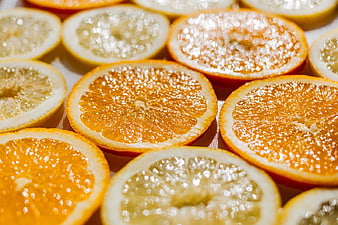Fresh Sliced Oranges and Lemons with Sugar Texture