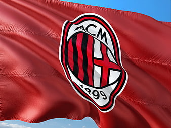 AC Milan Soccer Club Flag Waving Against Blue Sky