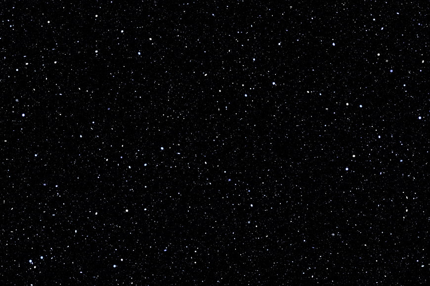 Deep Space Starfield Background with Scattered Stars