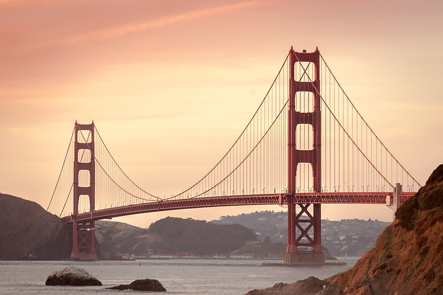 Golden Gate Bridge at Sunset with Warm Orange Sky