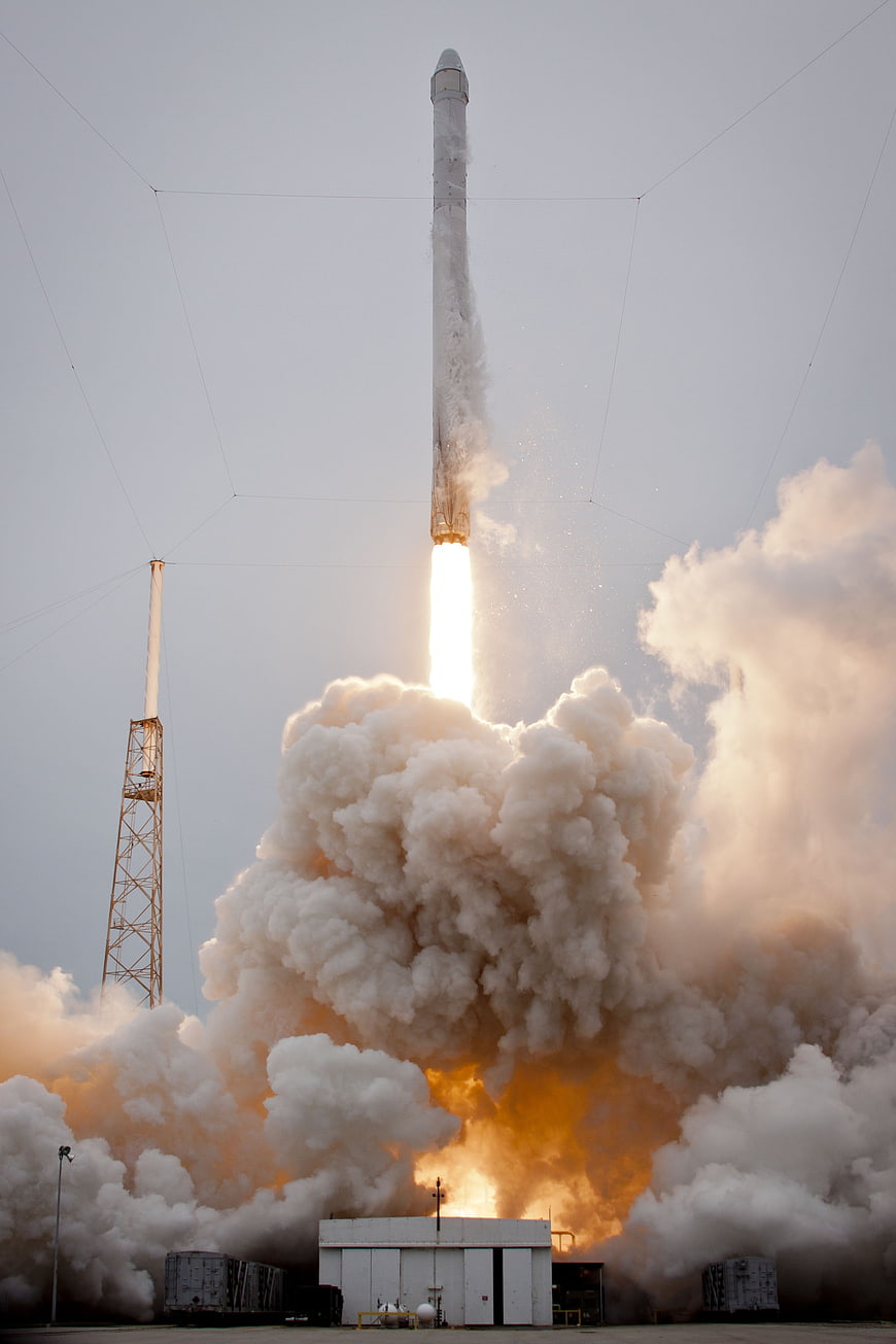 Rocket Launch With Massive Smoke Plume And Bright Exhaust