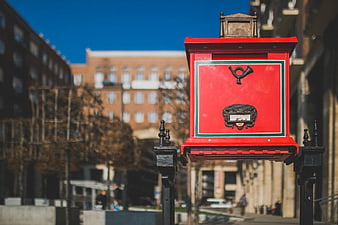 Vintage Red Post Box on City Street