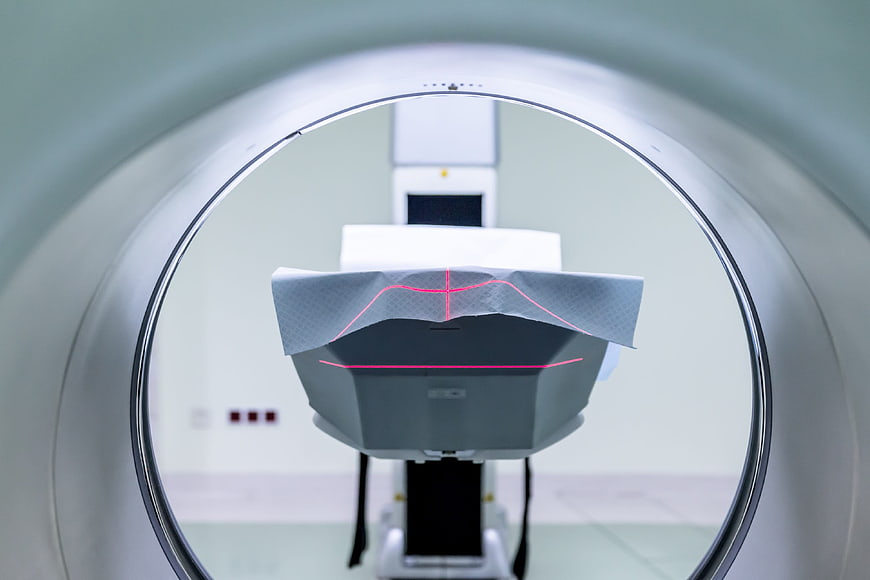 MRI Scanner Tunnel View with Red Laser Alignment Crosshairs