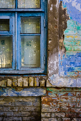 Weathered Blue Window Frame On Peeling Brick Wall
