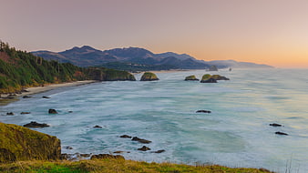 Serene Coastal Landscape with Sea Stacks at Sunset