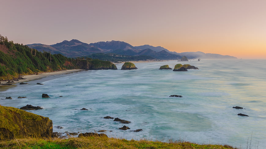 Serene Coastal Landscape with Sea Stacks at Sunset