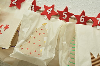 Homemade Advent Calendar With Felt Stars And Paper Bags