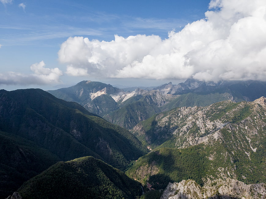 Majestic Mountain Landscape with Clouds and Green Valleys