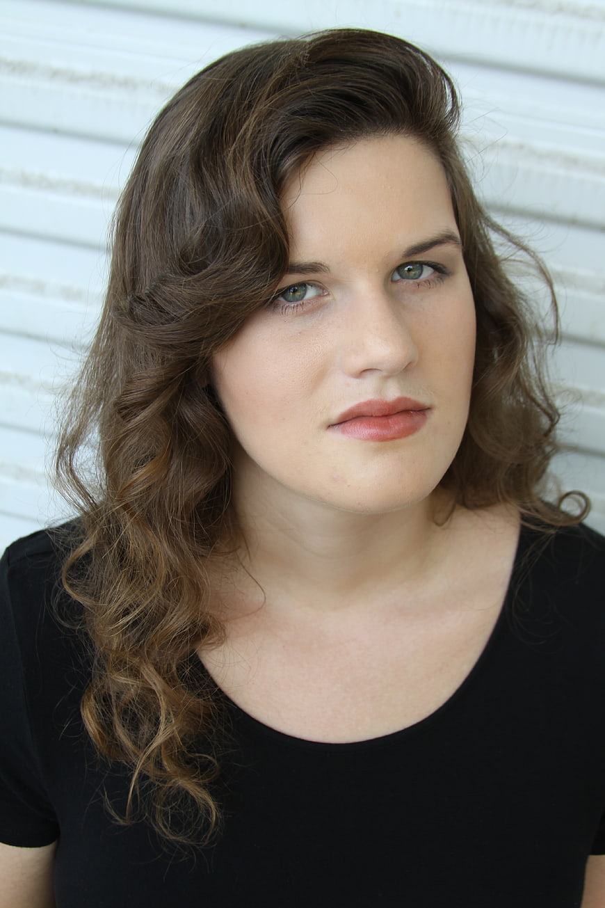 Close-up Portrait of Woman with Wavy Brown Hair