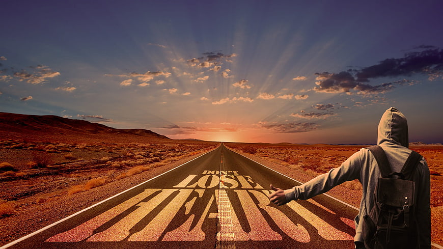 Hooded Hitchhiker on Desert Road with Don't Lose Heart Text