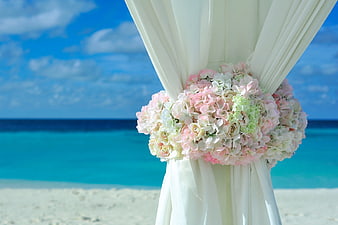 Beach Wedding Arch with Pink and White Flowers