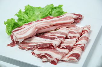 Fresh Raw Pork Belly Slices With Lettuce On White Plate