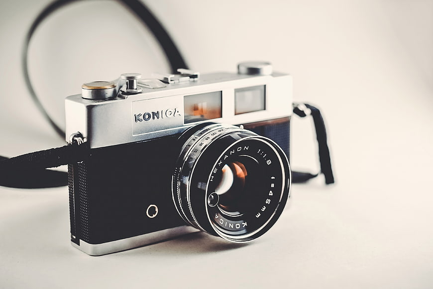 Vintage Konica Hexanon Film Camera on White Background
