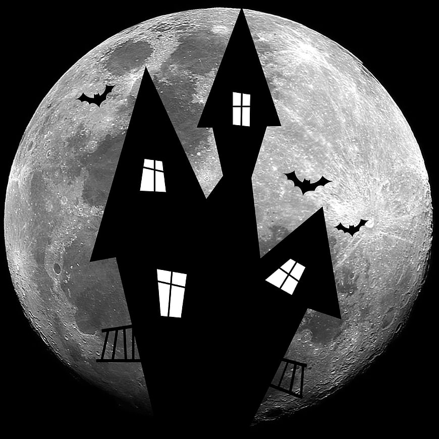 Silhouette of Haunted House with Bats in Front of Full Moon
