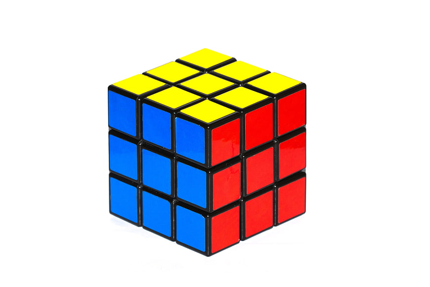 Solved Rubik's Cube Puzzle Toy On White Background