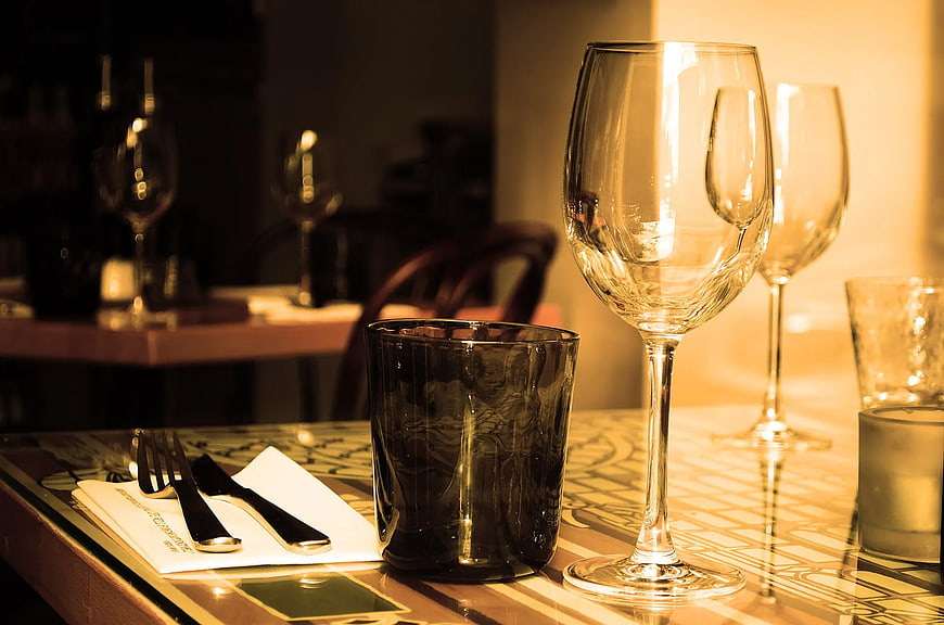 Elegant wine glasses and cutlery on a restaurant table