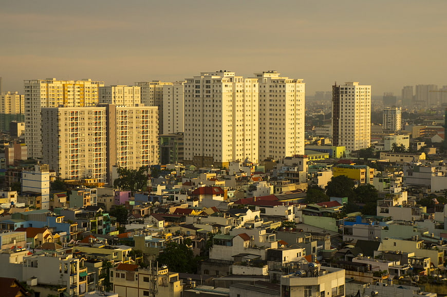 Aerial View of Saigon Cityscape with High-Rise Buildings and Low-Rise Housing