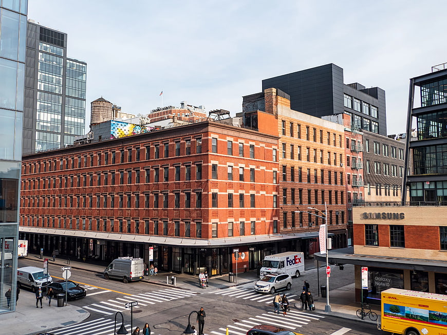 Urban Street Scene with Red Brick Buildings and Traffic