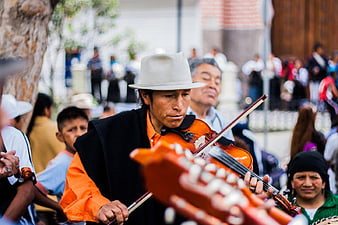 Man Playing Violin at Outdoor Cultural Festival