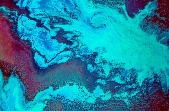Abstract fluid art background with swirling blue and red paint