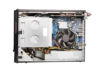 Internal components of a desktop PC tower showing motherboard and cooling fan