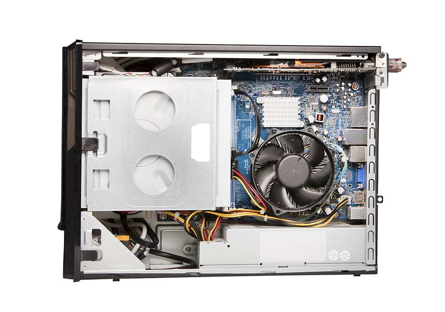 Internal components of a desktop PC tower showing motherboard and cooling fan