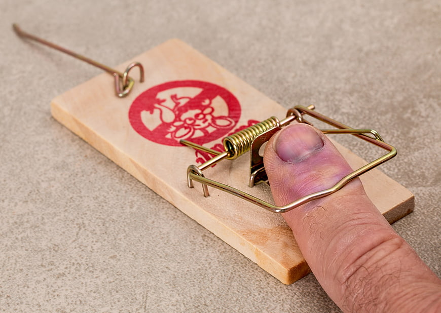 Swollen Finger Caught in Wooden Mousetrap