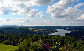 Panoramic Summer Landscape with Lake and Rolling Hills