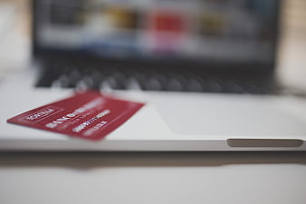 Red Credit Card on Laptop for Online Shopping