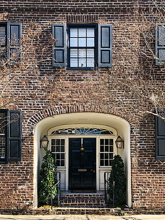 Classic Brick Townhouse Entrance with Black Door