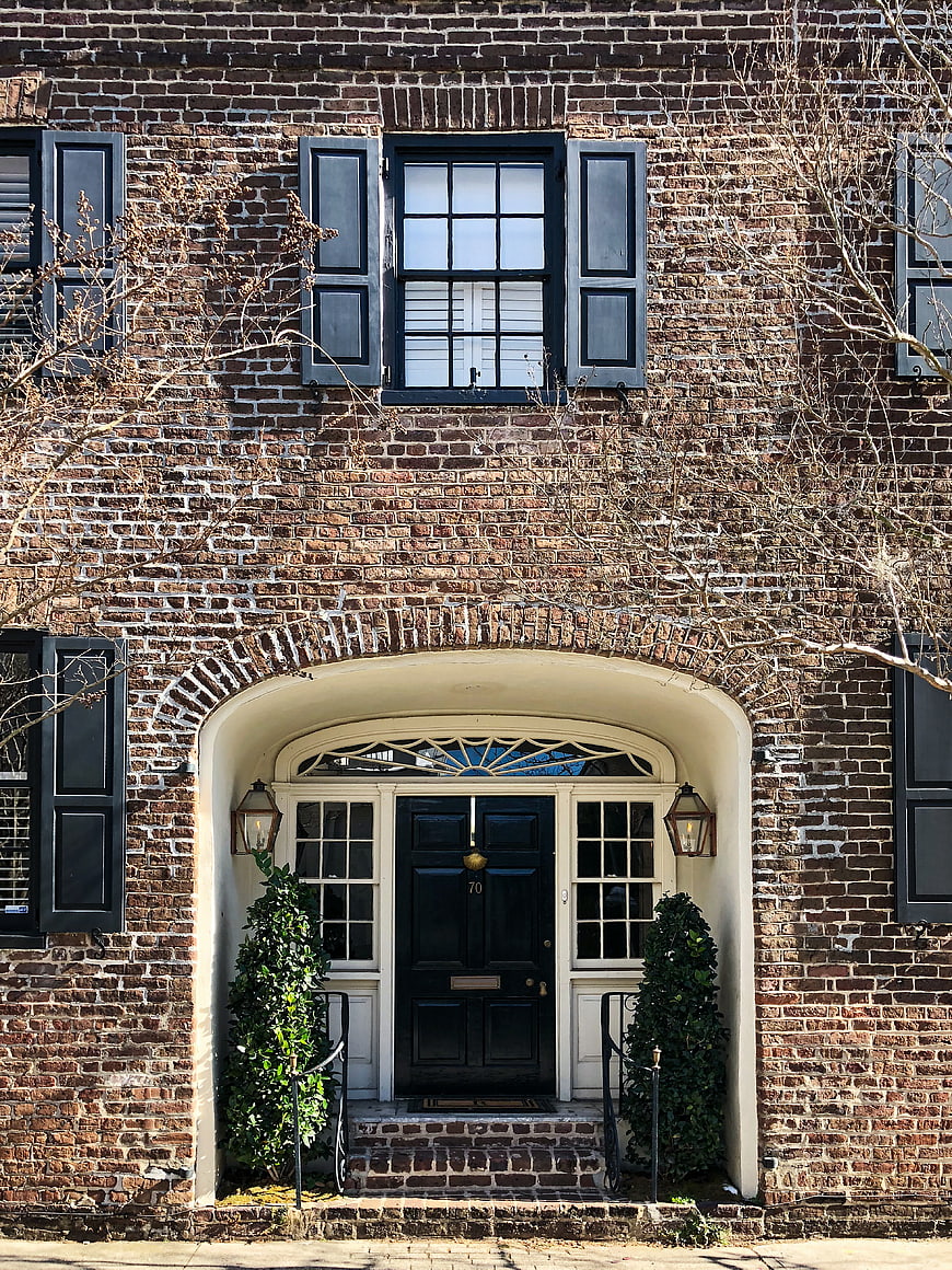 Classic Brick Townhouse Entrance with Black Door