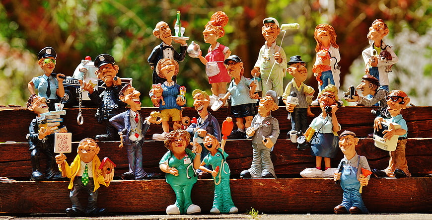 Colorful Garden Gnome Figurines Representing Various Professions