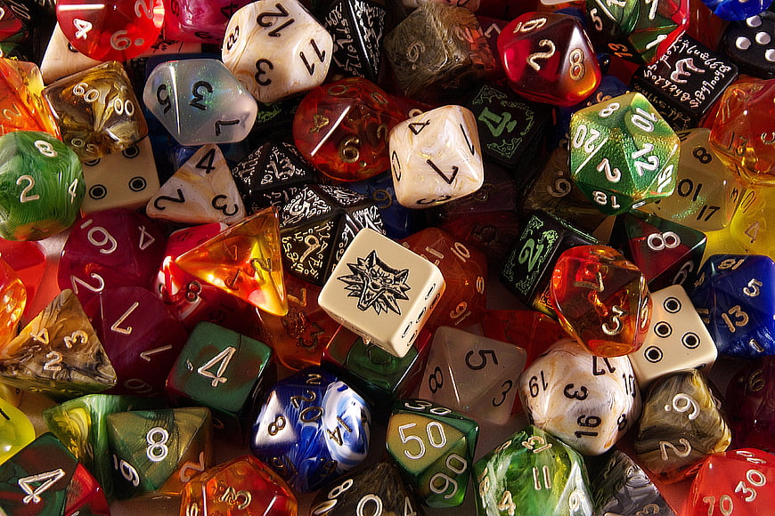 Colorful assortment of polyhedral RPG dice close-up