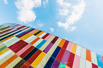 Colorful Modern Building Facade Against Blue Sky