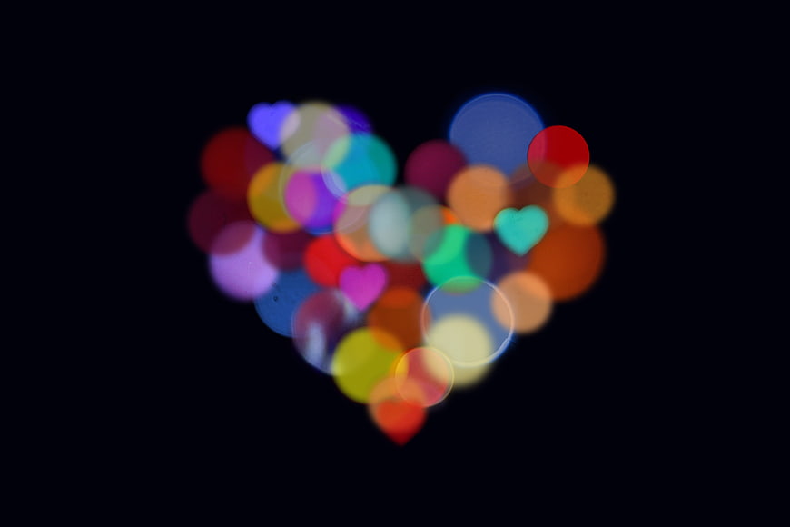 Colorful Heart Shaped Bokeh Lights on Black Background