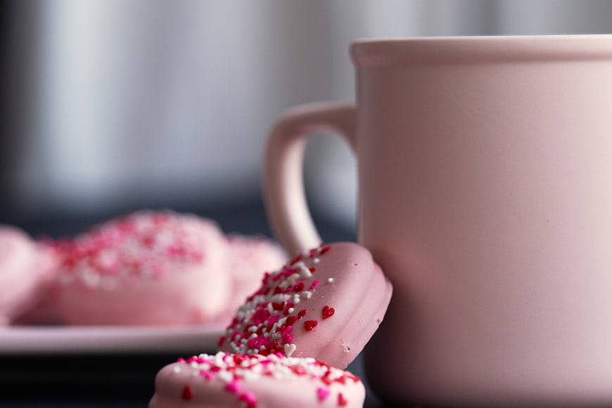 Pink Frosted Cookies with Heart Sprinkles and Mug