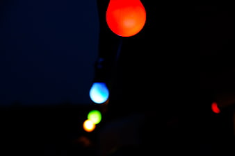 Colorful Christmas Lights Bokeh on Dark Night Background