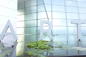 Modern Art Museum Architecture with Water Reflection